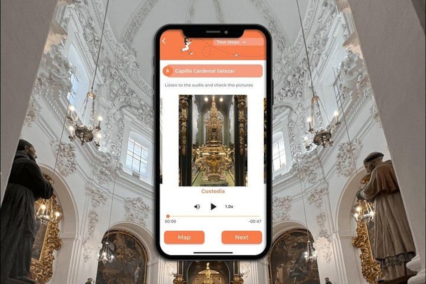 A smartphone displaying a museum exhibit with ornate architecture and statues. 3