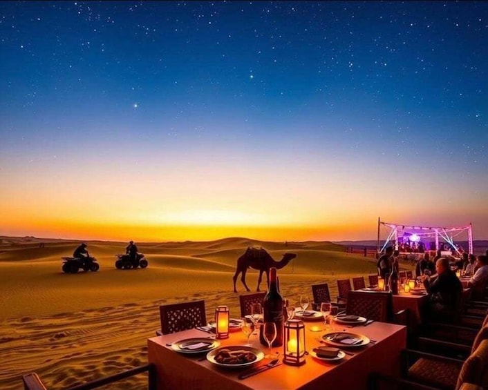 A desert sunset with a dining table set for two, a camel, and dune buggy riders in the background. 1