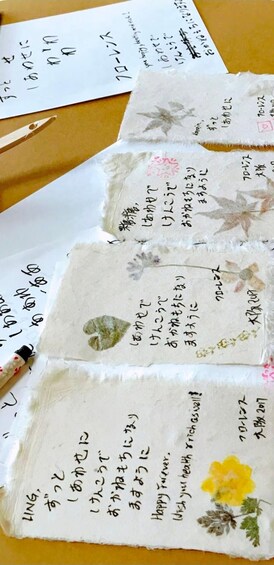 A collection of handmade cards with Japanese text and floral designs. 4