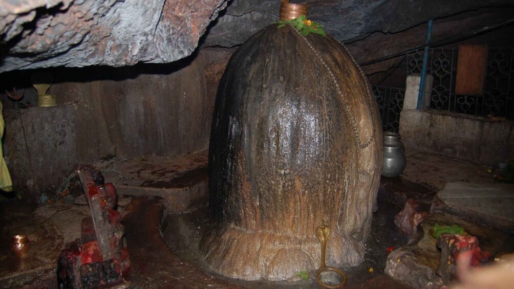 A stone bell inside a cave. 2