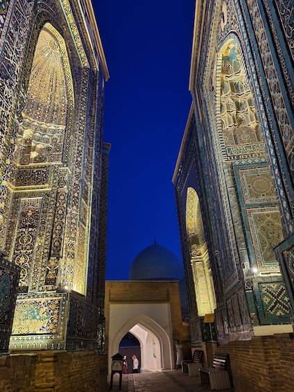 A mosque with intricate tile work and a dome. 3