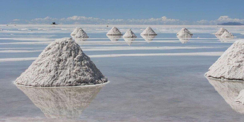 Salt formations in a flat landscape with reflections. 2