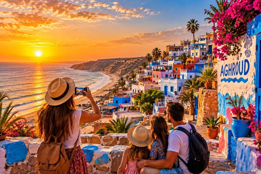 A sunset view of a coastal town with colorful buildings and a clear sky. 3