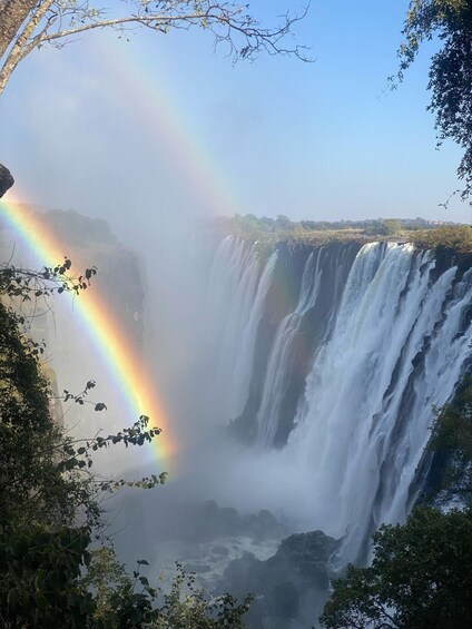 A waterfall with a rainbow. 2