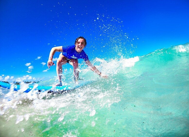 A person surfing a wave. 1