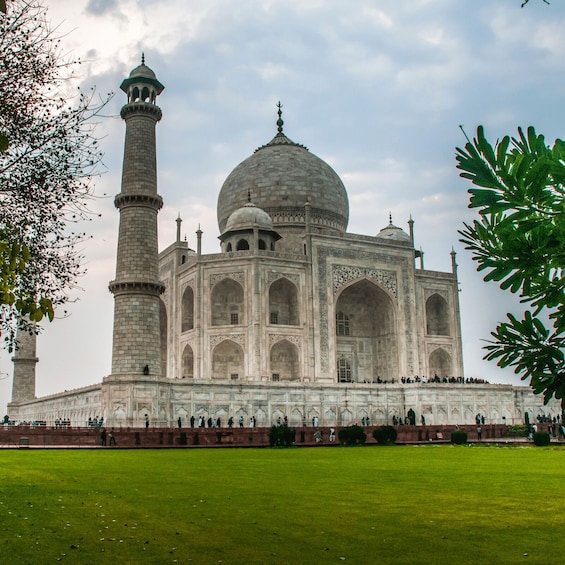 The Taj Mahal with its large central dome, four minarets, and surrounding gardens. 5