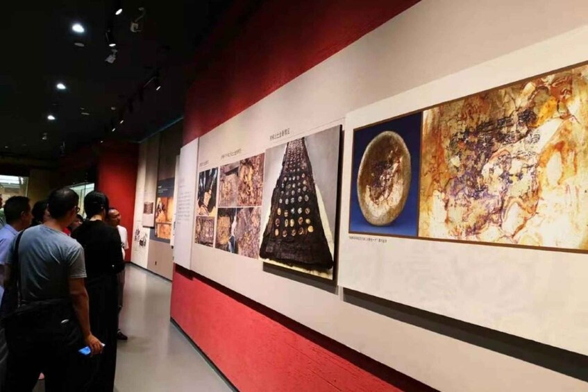 A museum exhibit with various artifacts and informational panels. 5