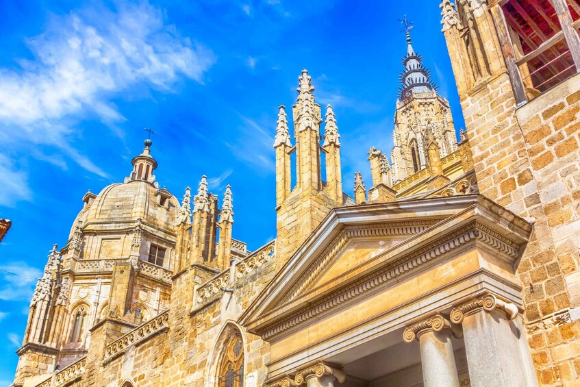 A historic church with ornate architecture, including multiple spires and a prominent dome. 3