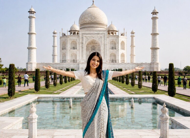 A person standing in front of the Taj Mahal with arms outstretched. 1