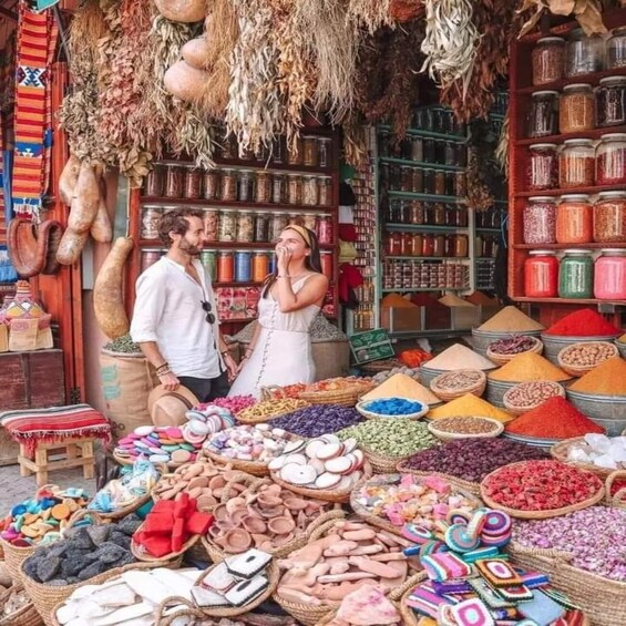 A market stall with various spices and dried goods. 1