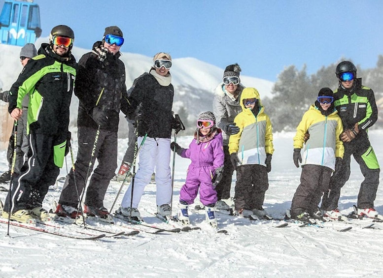 A group of people on skis at a ski resort. 4