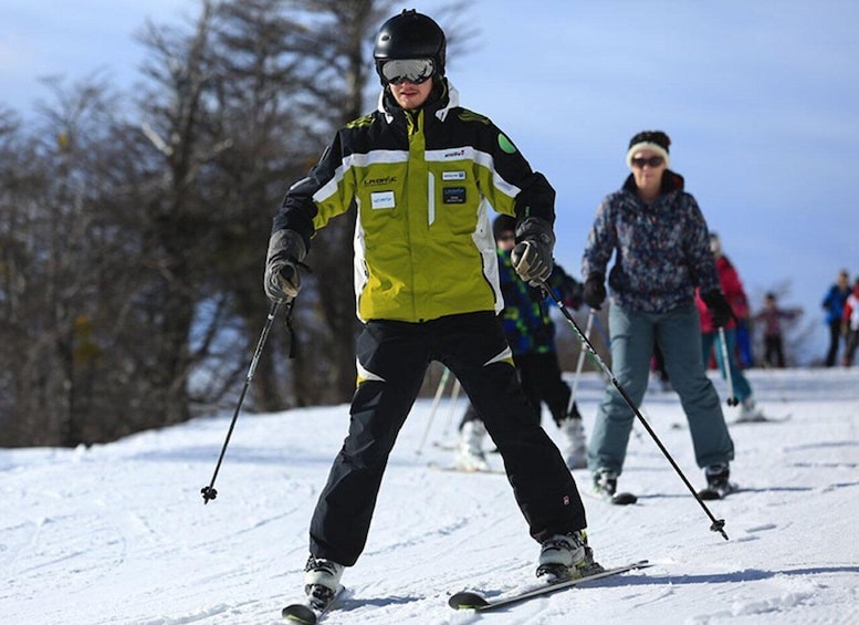 A person skiing on a snowy slope. 1