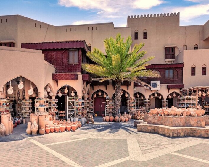 A traditional market with pottery and textiles. 3