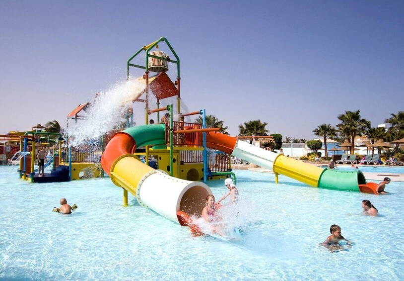 A water park with slides and water features. 5