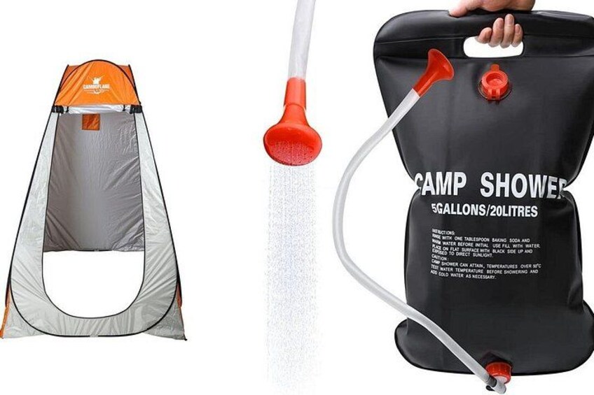 A camping shower setup with a tent and a water tank. 2