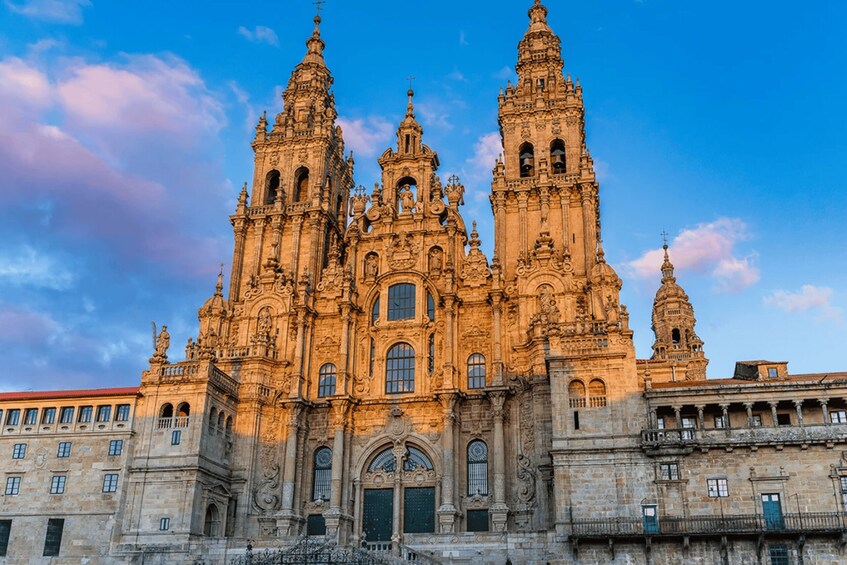 A grand cathedral with intricate architecture, multiple towers, and a prominent entrance. 1