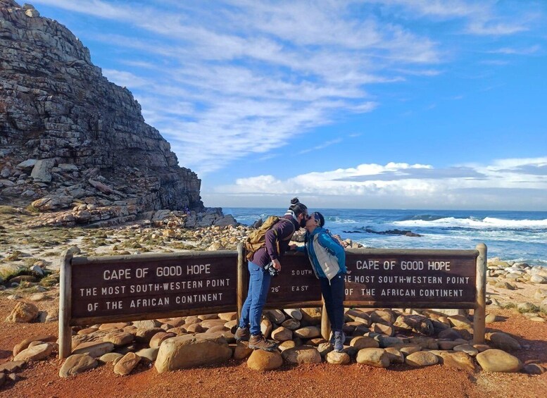 A couple kissing at Cape of Good Hope, the most south-western point of the African continent. 3