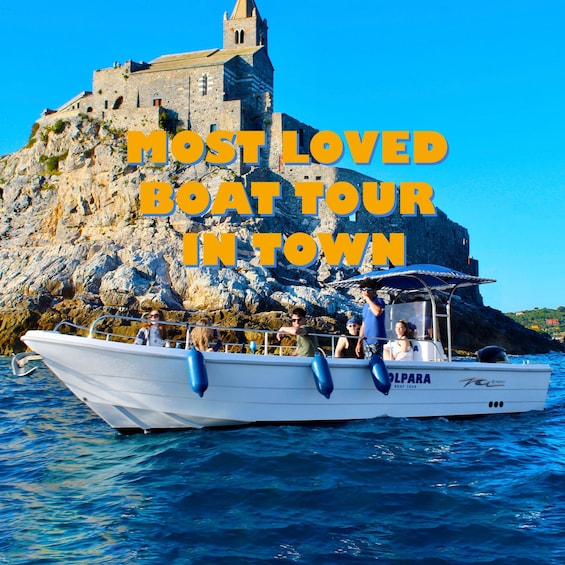 A boat tour with a historic castle in the background. 1