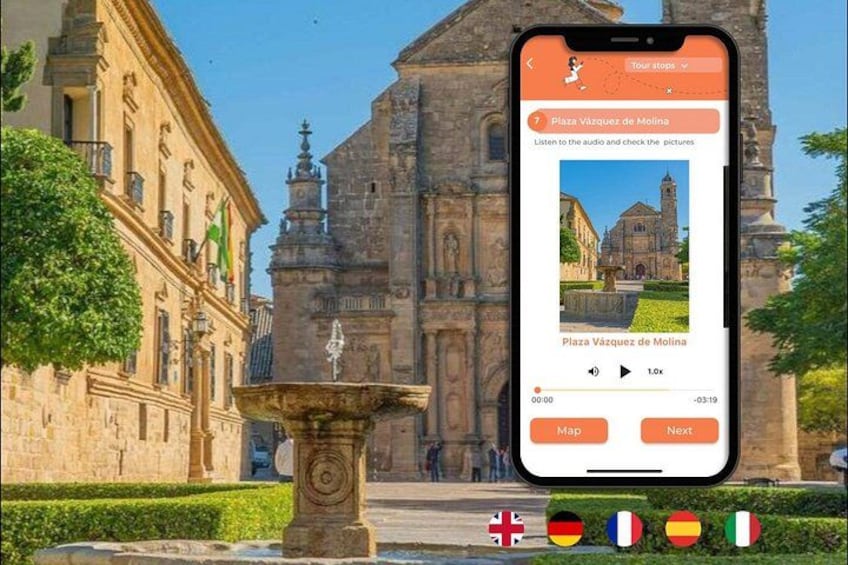 A smartphone displaying a tour of Plaza Vázquez de Molina with a historical building in the background. 1