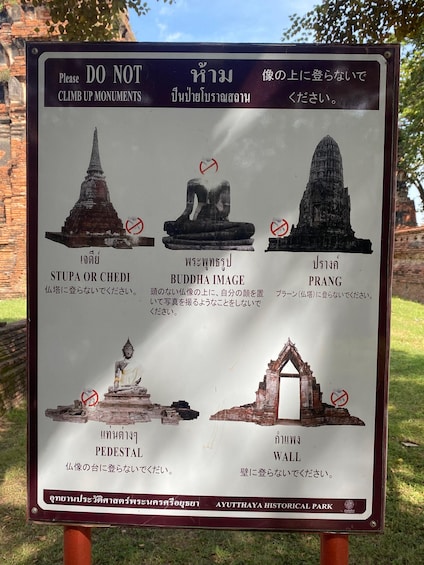 A sign with instructions not to climb up monuments at Ayutthaya Historical Park. 3