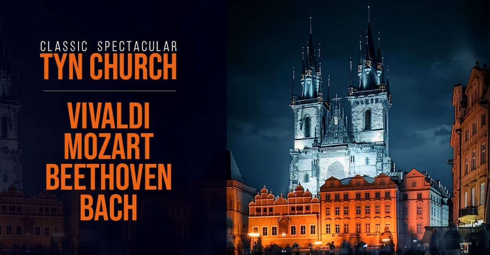 The Tyn Church illuminated at night with a dark sky. 1