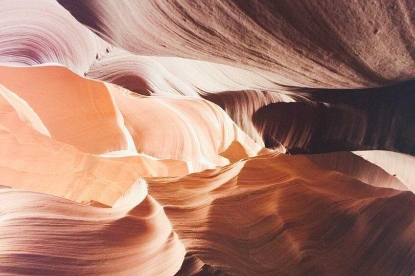 A canyon with layered rock formations. 3
