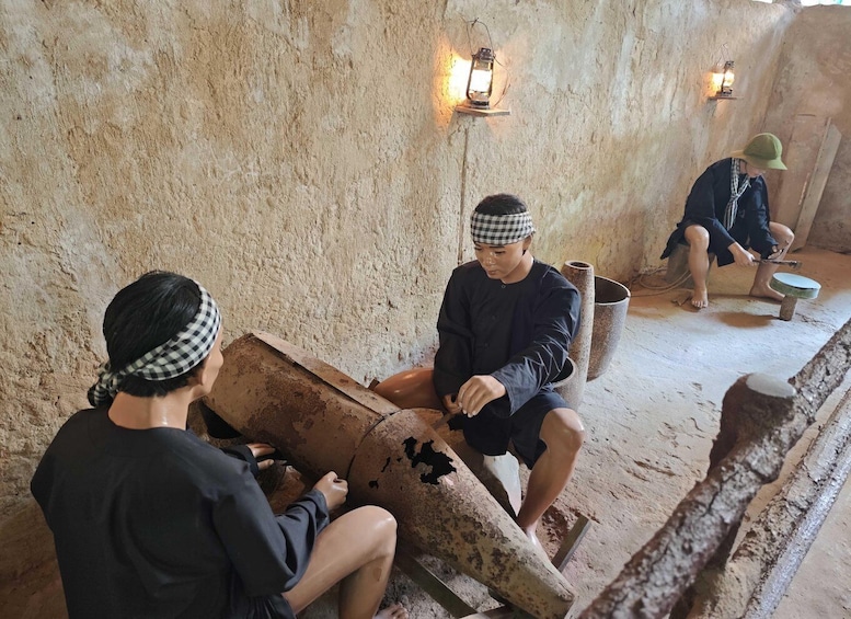 A traditional setting with people engaged in manual tasks, rustic walls, and simple lighting fixtures. 3