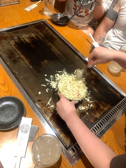 Picture 7 for Activity Osaka: Guided Food Tour with 12 Dishes and 2 drinks 4