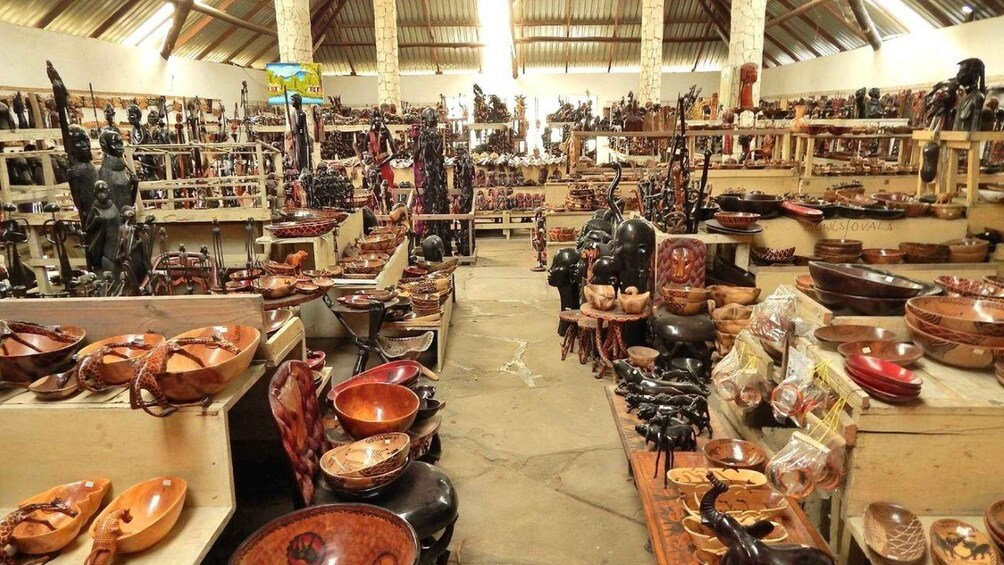 A market filled with various pottery and sculptures. 4