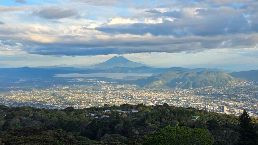 A cityscape with a mountain in the background. 4