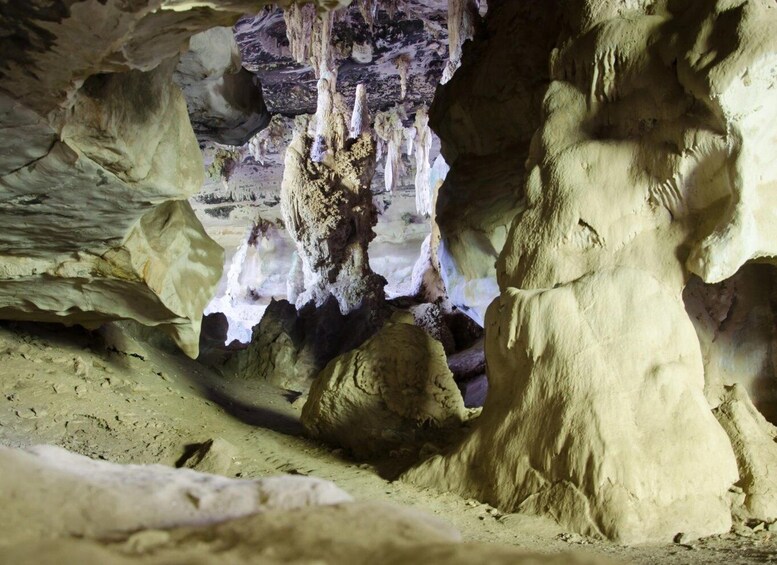 A cave with stalactites and stalagmites. 5