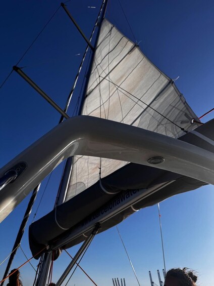 A sailboat with a clear sky in the background. 4