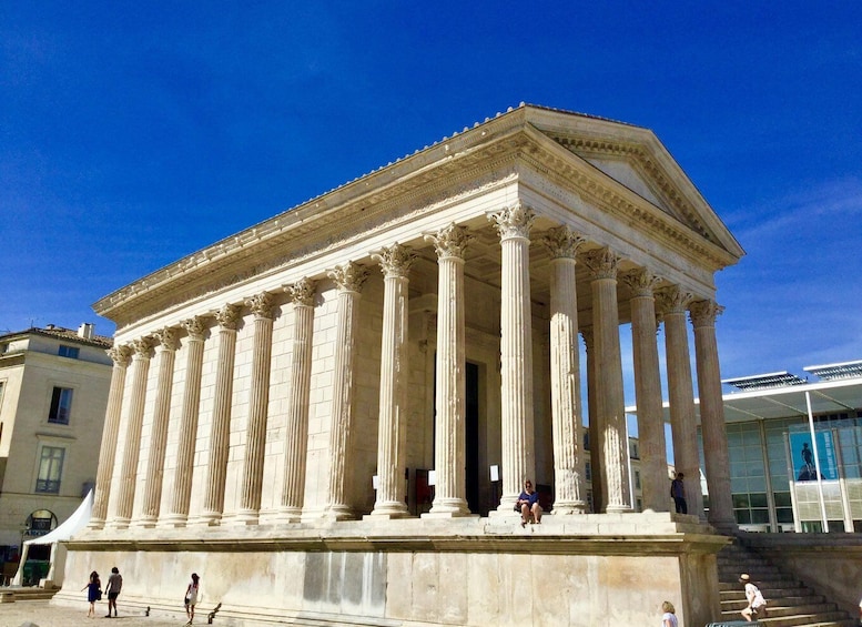 A classical building with columns and a pediment. 5