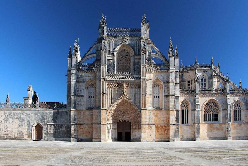 A large Gothic cathedral with intricate stonework and pointed arches. 5