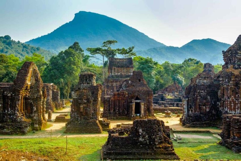 Ancient ruins with a mountain in the background. 1