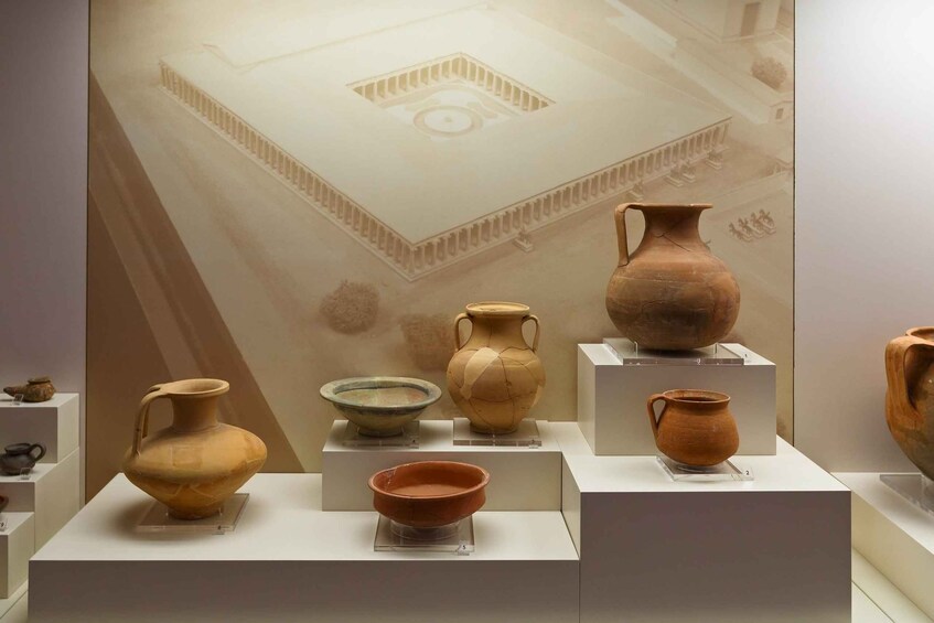 A museum display of ancient pottery. 3