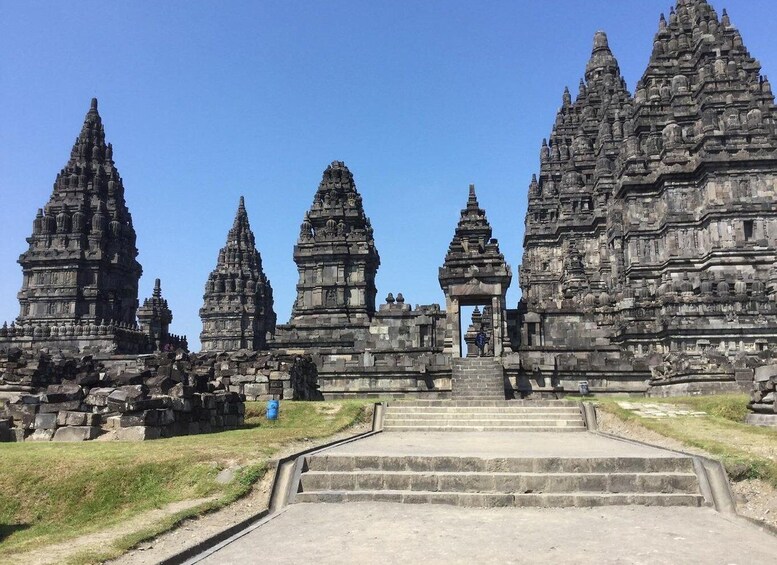 A temple complex with multiple tiered towers and a central entrance. 4