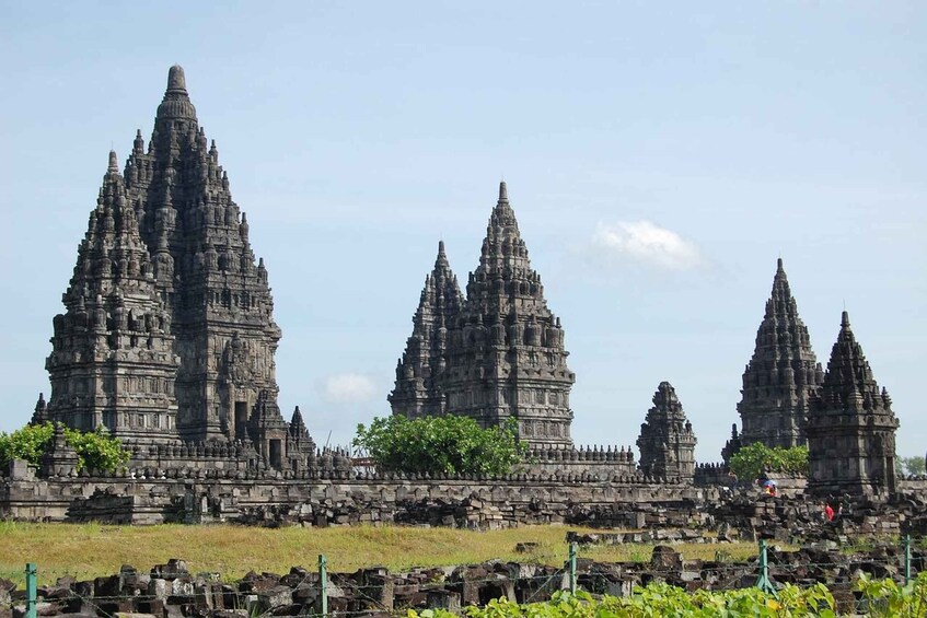 A temple complex with multiple tiered towers and intricate carvings. 3
