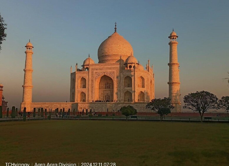 The Taj Mahal with its four minarets and large central dome. 1