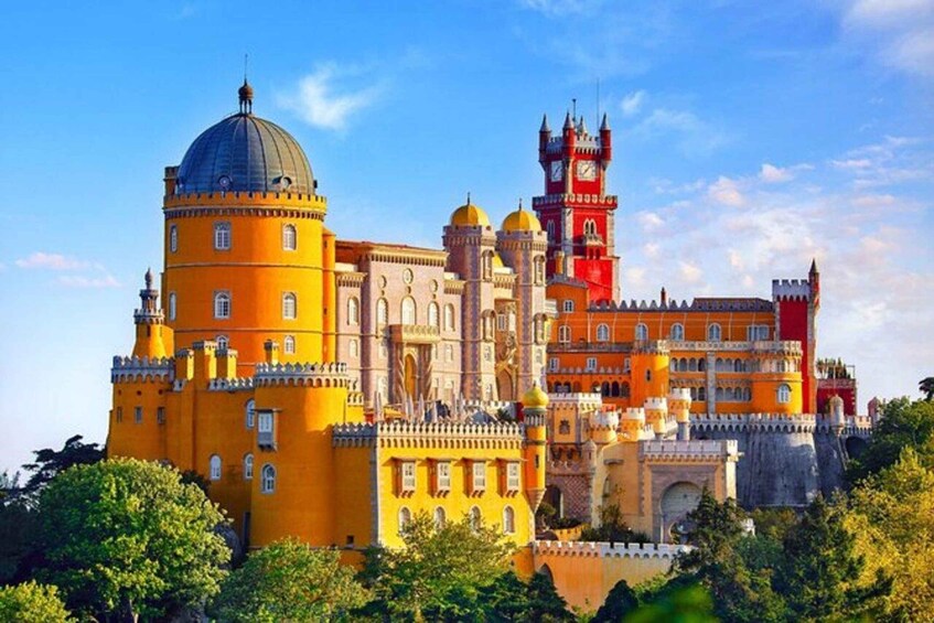 Pena Palace, a historic royal palace in Sintra, Portugal, with its distinctive yellow and red architecture. 1