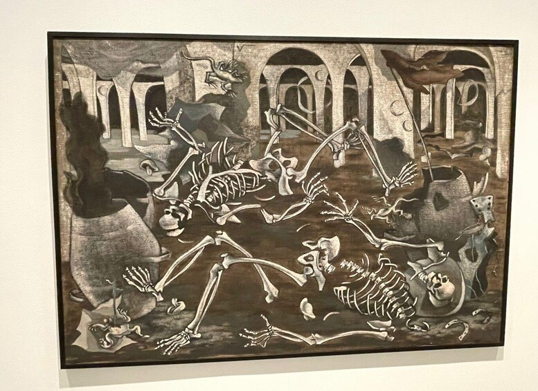 A sculpture of a skeleton with multiple arms and legs, set against a backdrop of arches and a dark, textured surface. 4