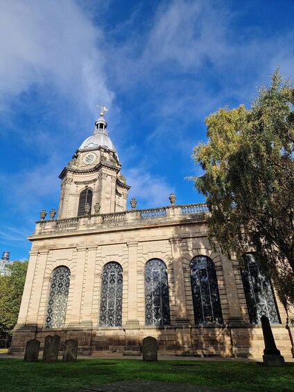 A historic building with a dome and arched windows. 4