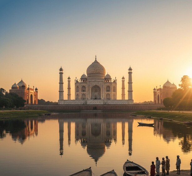 The Taj Mahal with its reflection in the water, surrounded by smaller domed structures. 5