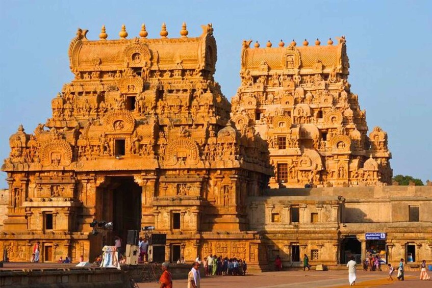 A large, intricately carved temple with multiple spires and detailed sculptures. 5