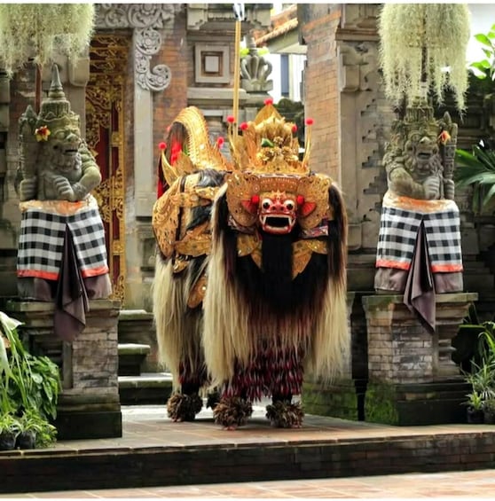 A traditional Balinese dance performance with elaborate costumes and a temple backdrop. 3