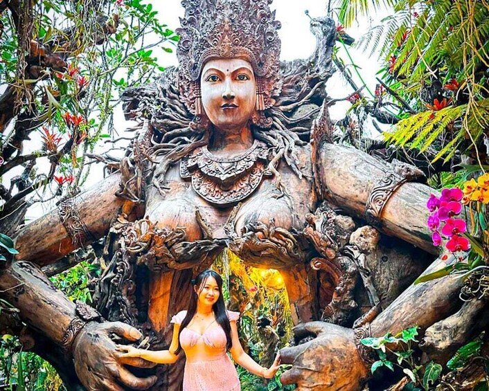 A statue surrounded by natural elements. 1
