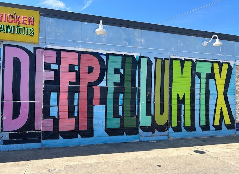 A colorful mural with the text 'DEEP ELLUMTX' on a building. 5