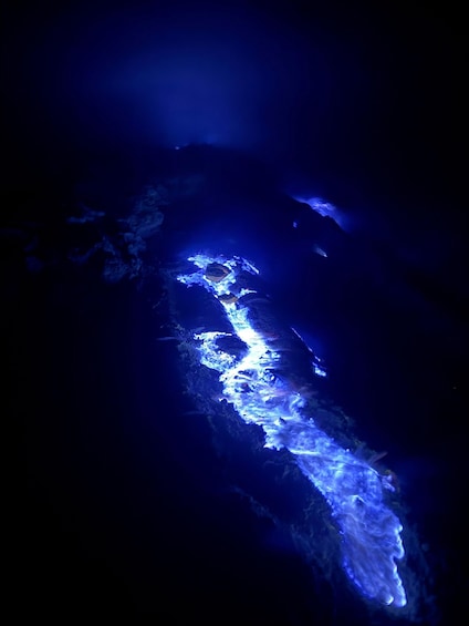 A cave illuminated by blue light. 1