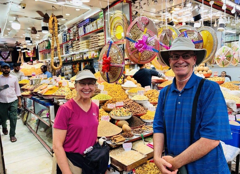 A market with various food items on display, including grains and nuts. 1