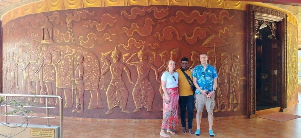 A mural with figures and a door. 3